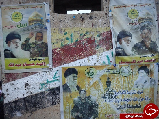 عراقی ها عکس شهدای خود را چگونه در شهرهایشان نصب می کنند؟+عکس